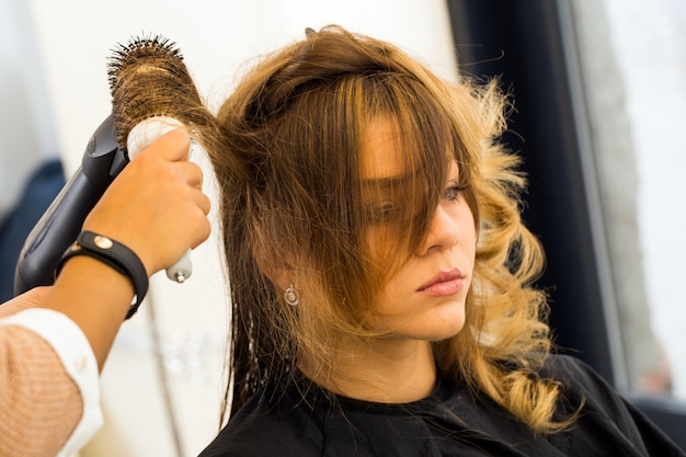 Woman at the hairdresser salon