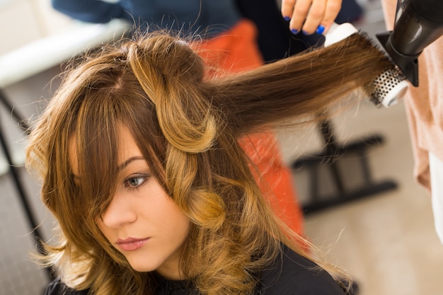 Woman at the hairdresser salon