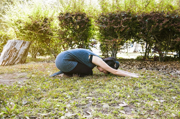 Woman in half tortoise position