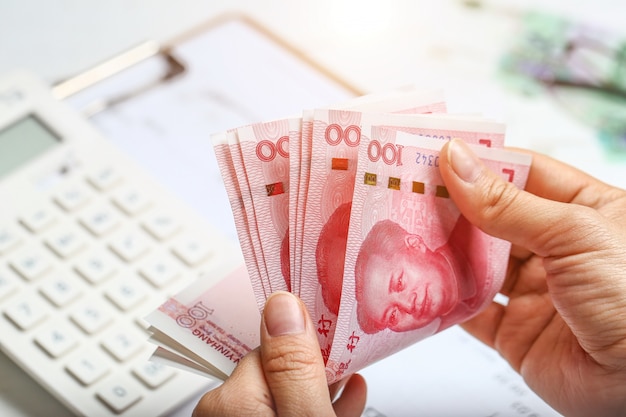 woman hand counting money rmb