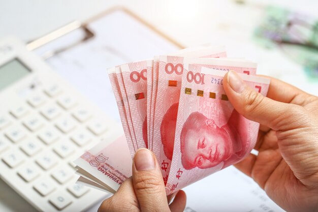 woman hand counting money rmb