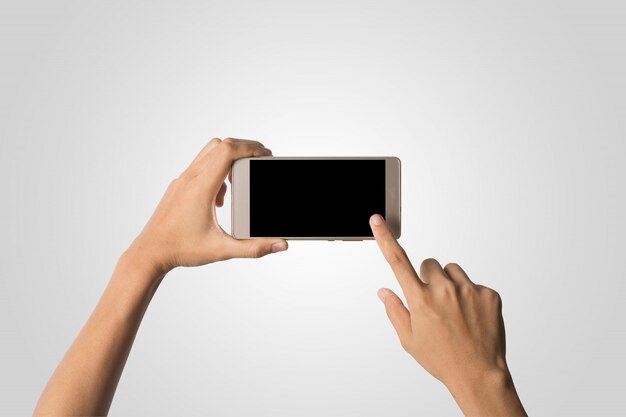 女性スマートフォンのブランク画面を持って手。スペースをコピーします。手、スマートフォン、白、背景、