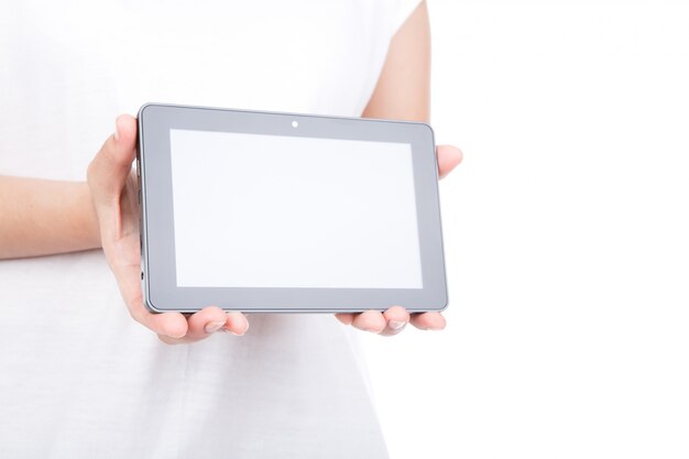 Woman hand using a touch screen device against white background