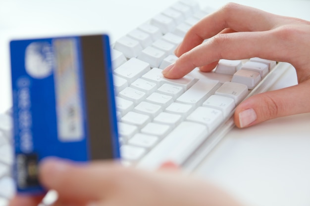 Woman hands, laptop, credit card, shopping online payment