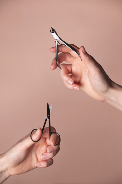 Woman hands with nail care product