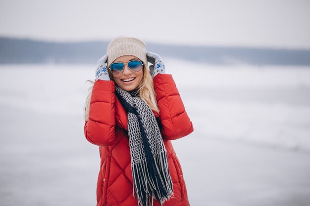 Woman happy portrait in winter outside in park