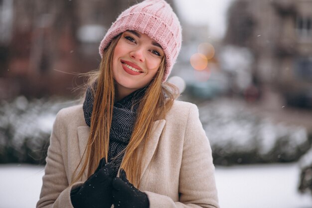 Woman happy in a winter park