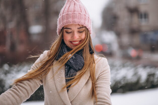 Woman happy in a winter park