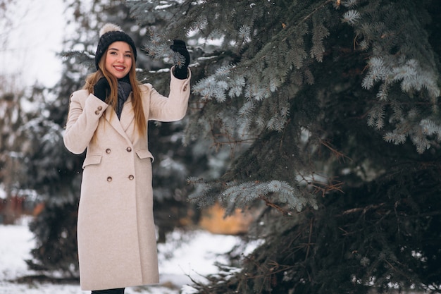 Woman happy in a winter park