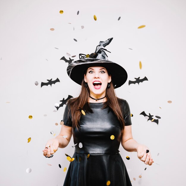 Woman in hat with confetti