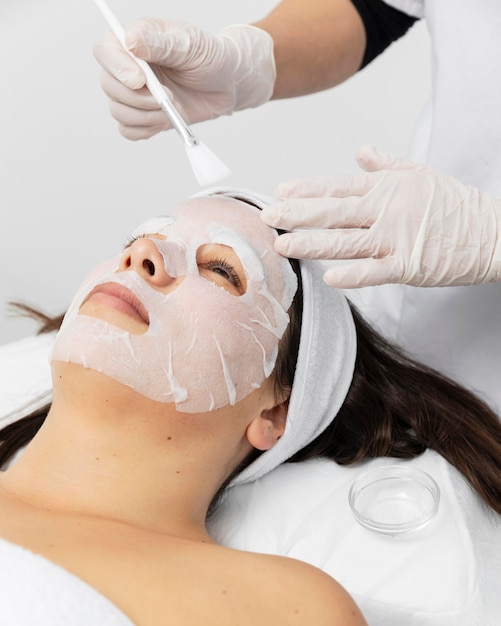 Woman having a facial skincare treatment