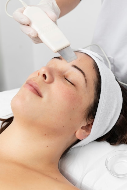 Woman having a facial skincare treatment