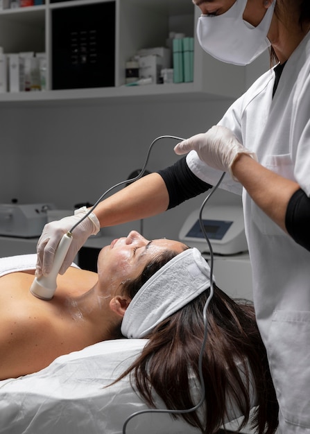 Woman having a facial treatment