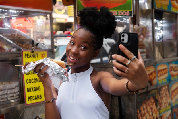 Woman having fun at food festival