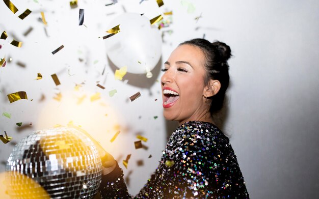 Woman having fun at a new year party