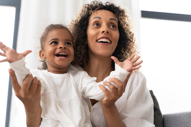 Woman having fun with her baby girl