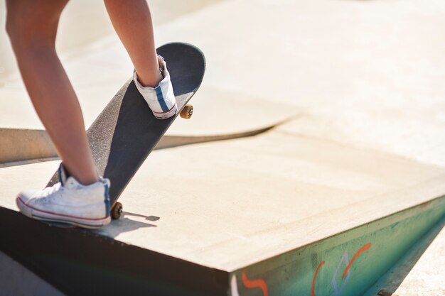 Woman having fun with skateboarding