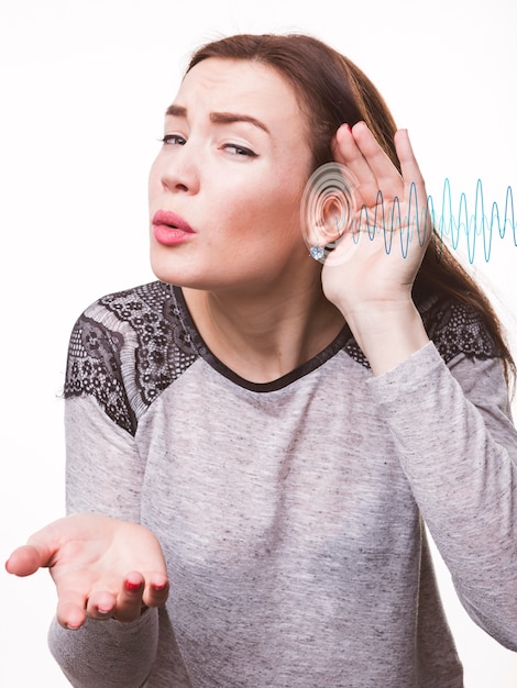 Woman having hearing problems