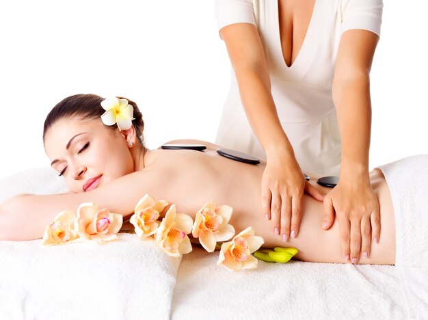 Woman having massage of body in the spa salon. Beauty treatment concept.