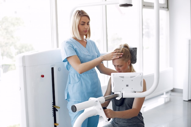 Woman having rehabilitation after injury in physiotherapy room