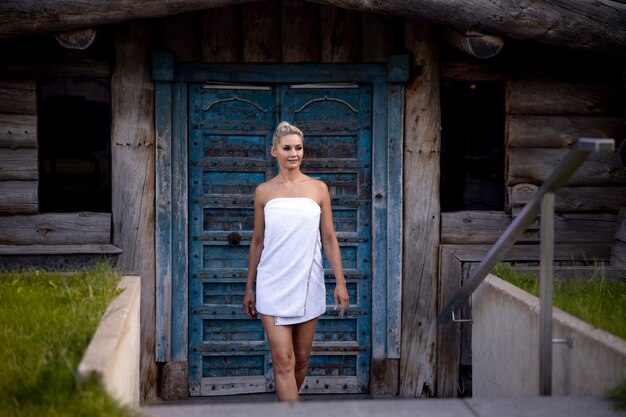 Woman having some quality time at a spa hotel outdoors