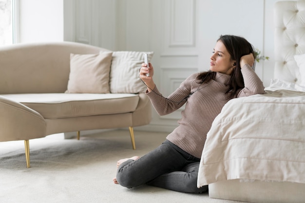 Woman having a video call on her phone