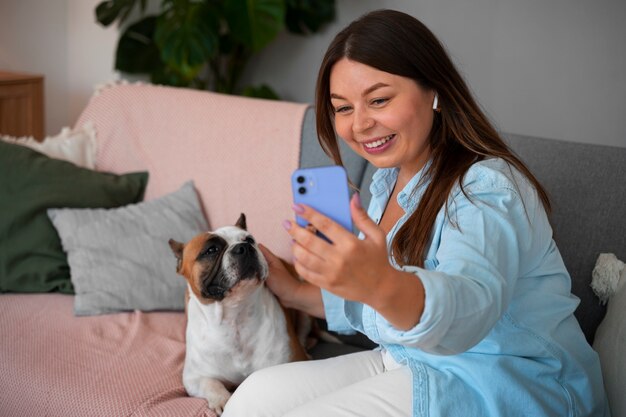 Woman having a video call at home with a smartphone device