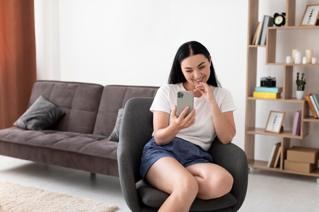 Woman having a videocall with her family