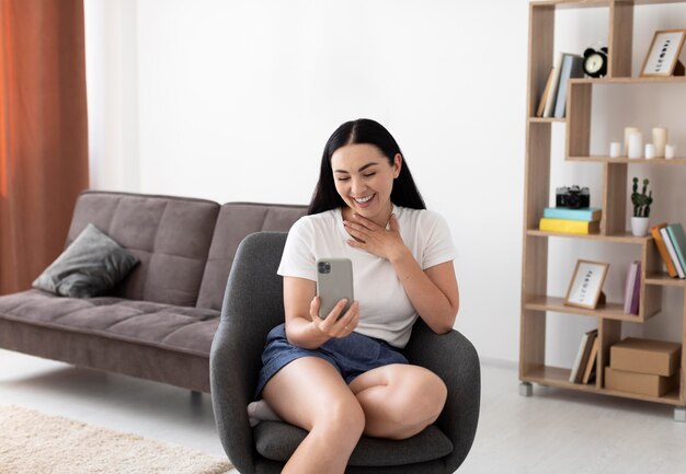 Woman having a videocall with her family