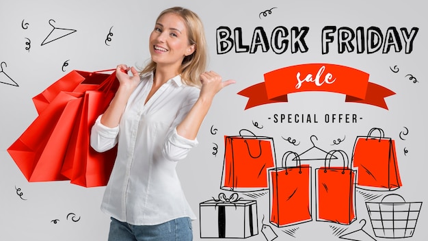 Woman holding black friday shopping bags