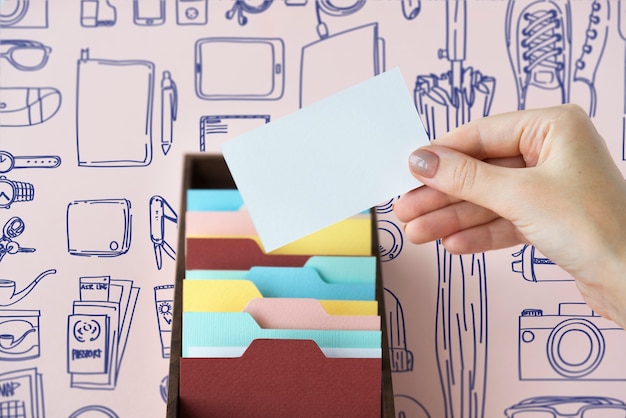 Woman holding blank business card