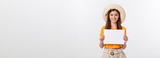 Woman holding blank card isolated on white background smiling female portrait