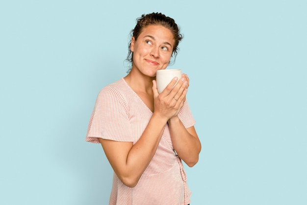 Woman holding coffee mug