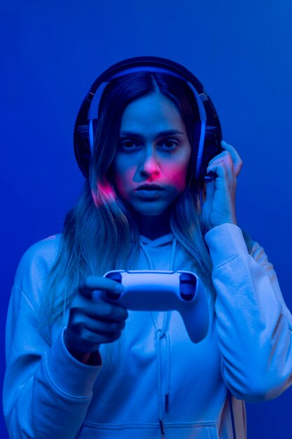 Woman holding  controller medium shot