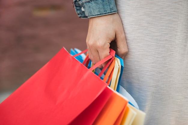 Woman holding different shopping packets