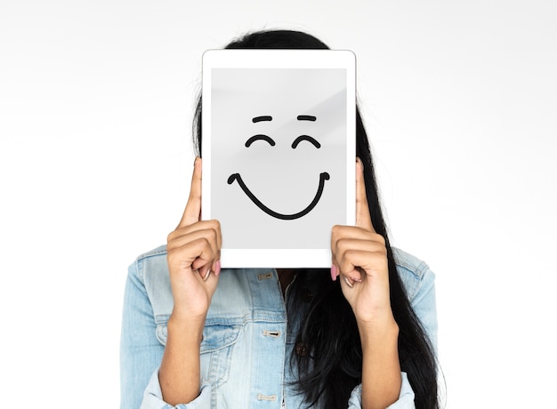 Woman holding digital device covering face photoshooting for photograph