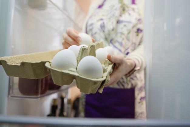 Free photo woman holding eggs