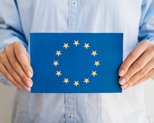 Woman holding european union envelope