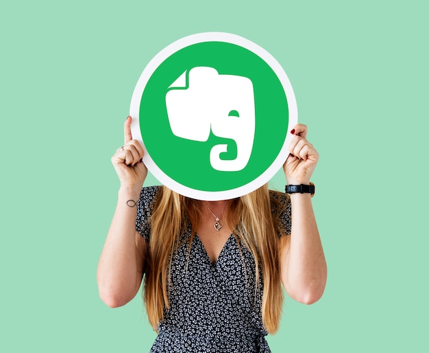 Free photo woman holding an evernote icon