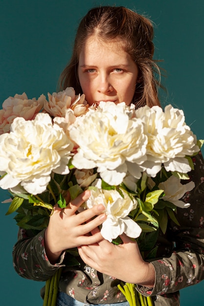 Woman holding flower bouquet