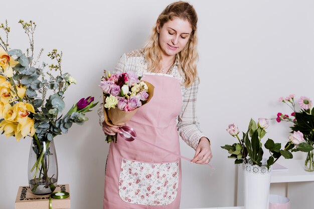 Woman holding flowers in bunch