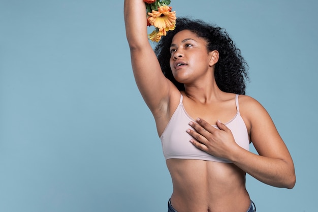 Woman holding flowers medium shot