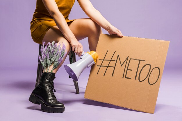 Woman holding gender equality "me too" sign