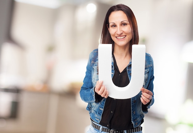 Free photo woman holding letter 