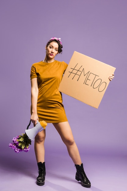 Woman holding megaphone and cardboard front view