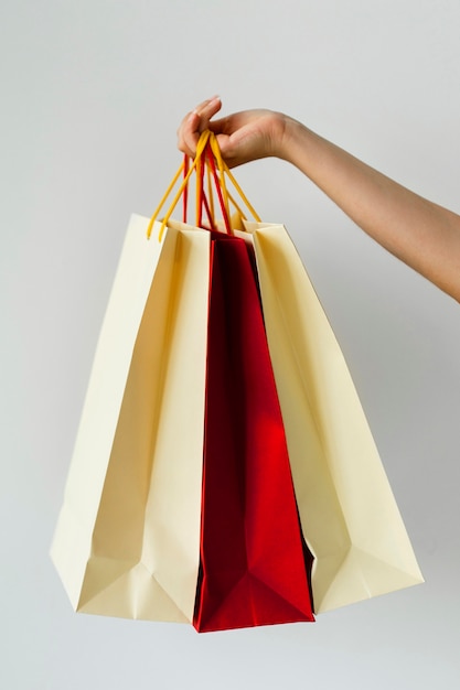 Woman holding multiple shopping bags