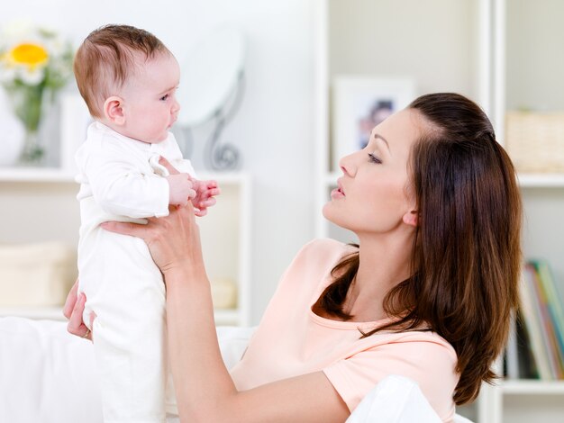 Woman holding newborn baby