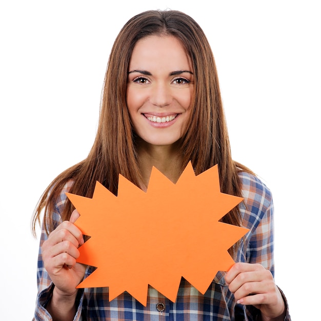 Woman holding orange panel isolated on white background