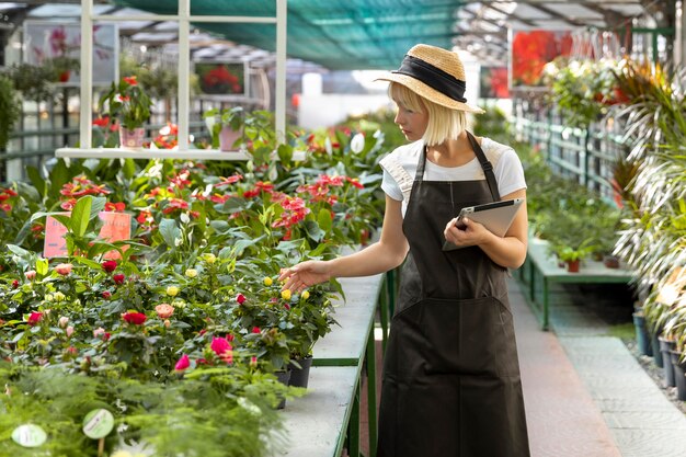 Woman holding tablet medium shot