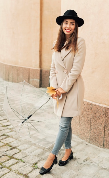 Woman holding a transparent umbrella